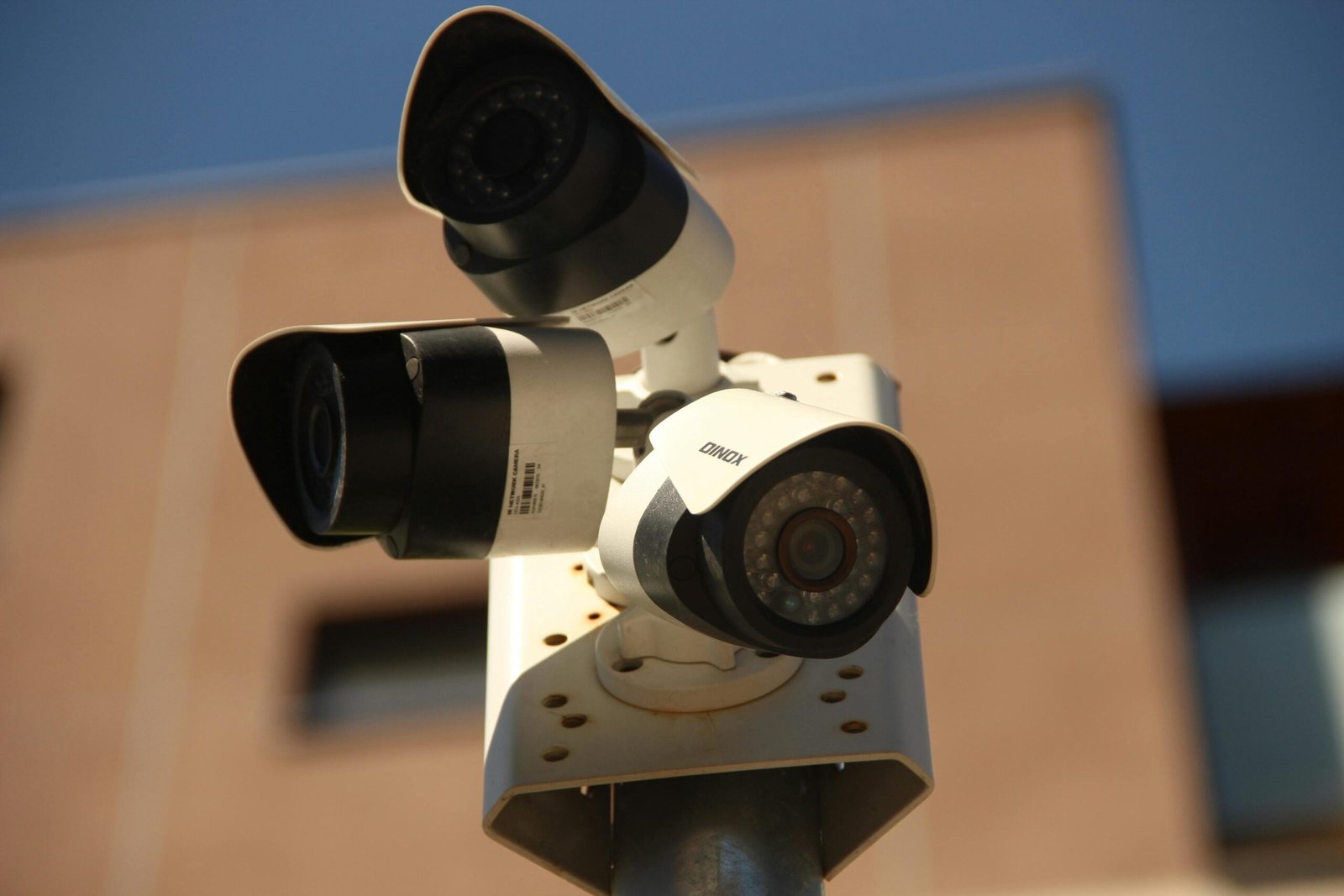 Home High-resolution surveillance cameras installed in a city environment for security purposes.